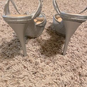 Gianni Bini Silver Dressy Heels. Heel is approximately 4 to 5”. Size 7.5